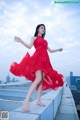 Beauty Crystal Lee ventured into blooming on the roof of a high-rise building (8 photos)